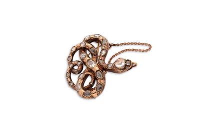 BROCHE-PENDENTIF Broche-pendentif "serpent"
Diamants facettés, or 14K (585).
Dim.:...