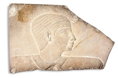 null BAS-RELIEF AMARNIAN in limestone representing a man's head with a straight
profile...