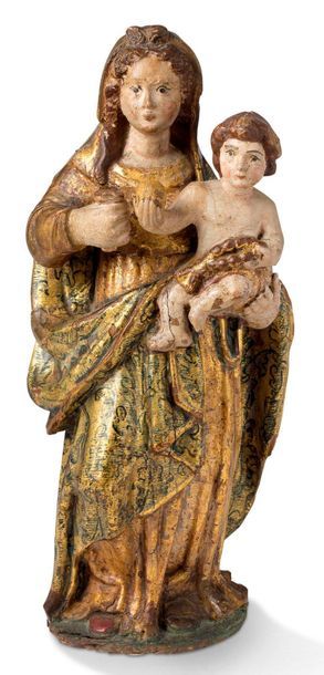 null CHILD'S VIRGIN in carved and polychromed wood. The Child, seated on the left...