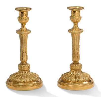 Pair of chased and gilded bronze FLAMBEAUX,...