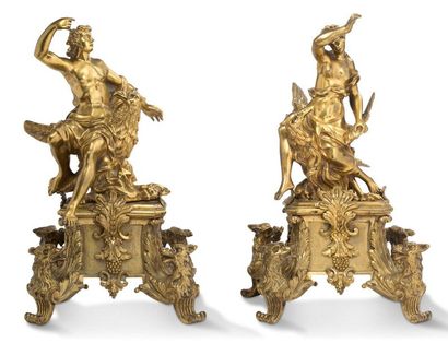 PAIR OF CHENETS in chased and gilded bronze,...