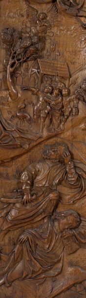 null GRAND PANNEAU de forme cintrée en noyer sculpté en bas-relief représentant Jésus...