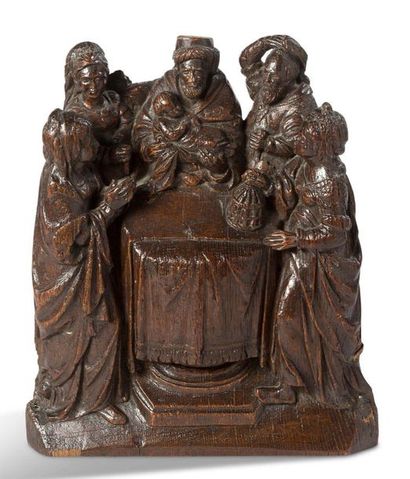 null GROUP in carved oak representing the Presentation of Jesus in the Temple. In...