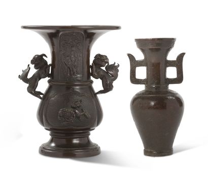CHINE - VIETNAM XVIIE ET XIXE SIÈCLE Two bronze vases, one with small thin handles...