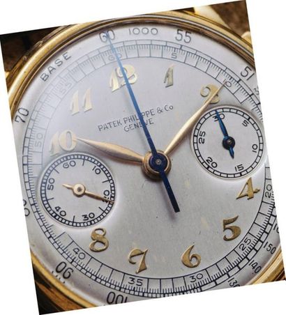 PATEK PHILIPPE Chronographe 
Gold case
Hand-wound mechanical movement
Diam: 33 mm
Leather...