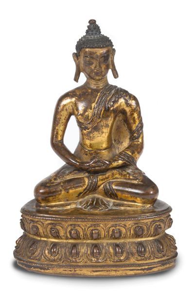Tibet XVIIIe siècle Sujet en bronze doré, représentant le Bouddha assis en méditation...
