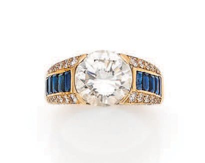 null BAGUE «DIAMANTS»
Diamant taille brillant, saphirs calibrés
Or jaune 18K (750)
Poids...
