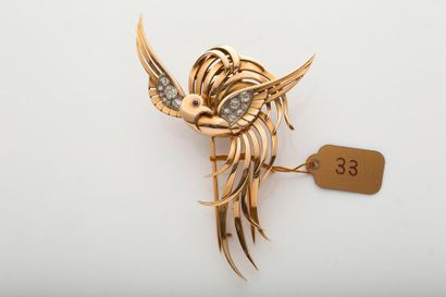 null CLIP «OISEAU»
Diamants taille ancienne, rubis, or rose 18K (750). Vers 1940.
H.:...