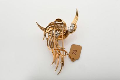 null CLIP «OISEAU»
Diamants taille ancienne, rubis, or rose 18K (750). Vers 1940.
H.:...