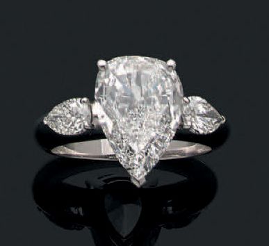 null BAGUE «DIAMANT»
Diamant poire taille brillant, diamants baguettes, or gris 18K...