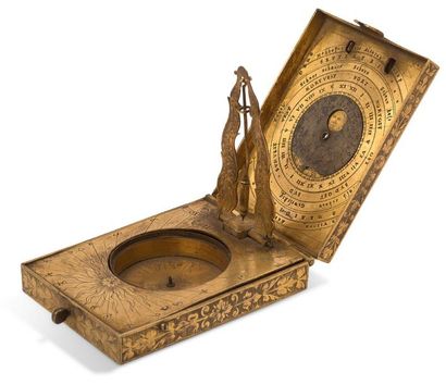 null Exceptional rectangular diptych sundial in gilt brass. The lid indicates the...