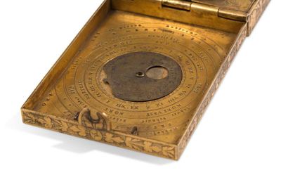 null Exceptional rectangular diptych sundial in gilt brass. The lid indicates the...