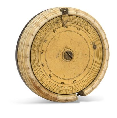 null ~Charming gilt brass equatorial sundial in a cylindrical ivory wickerwork box...