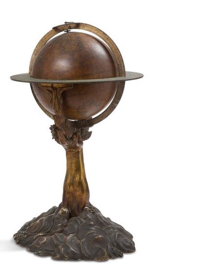 null Pair of globes, terrestrial and celestial supported by gilt bronze dexter arms...