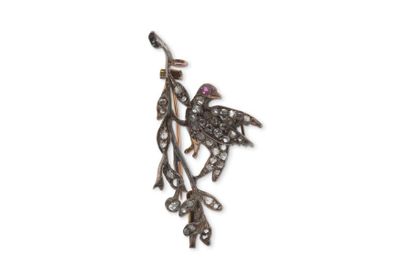 null Broche-pendentif "oiseau sur branche"

diamants de taille rose, rubis, or 18K...