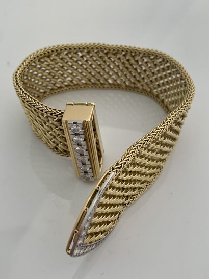 null BRACELET "BELT"
Diamond clasp, 18K (750) gold mesh, platinum (850)
L.: approx....