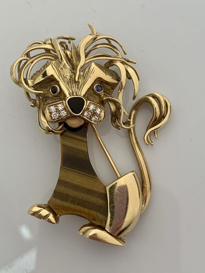 null CLIP "LION"
Tiger's eye, diamonds, sapphires, enamel
Yellow gold 18K (750)
H.:...
