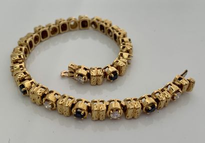 MAUBOUSSIN Line" bracelet
Sapphires and diamonds
18K (750) gold
Signed and numbered,...