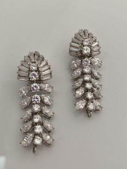 BOUCHERON 
Pair of earrings. Baguette, round and navette diamonds, removable Tahitian...