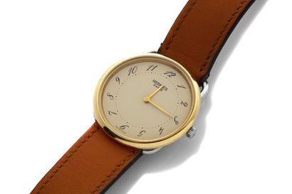 Hermès Hermes 

Arceau 

Vers 2000

Boitier plaqué or 

Mouvement quartz 

Diam:...