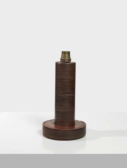 Paul DUPRE-LAFON pour HERMES LAMP STAND Cylindrical Fut made of laminated discs covered...