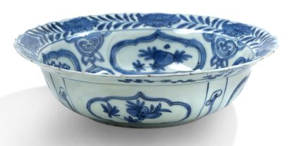 CHINE 
A kraach type white porcelain floriform bowl enamelled in blue underglaze,...