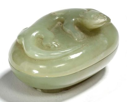 CHINE 
Lot comprising a celadon jade group, representing two elongated deer holding...