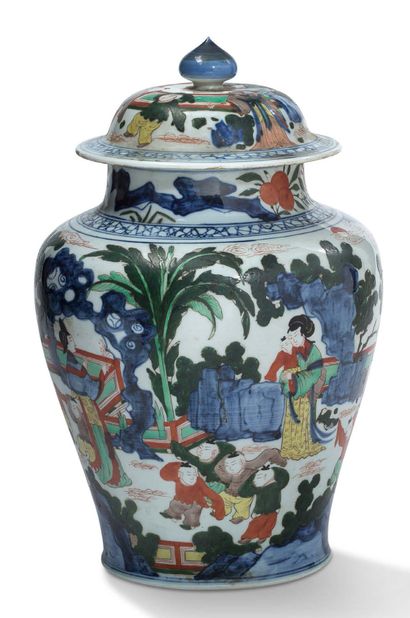 CHINE 
A Wucai-style porcelain and enamel covered baluster vase, decorated with young...