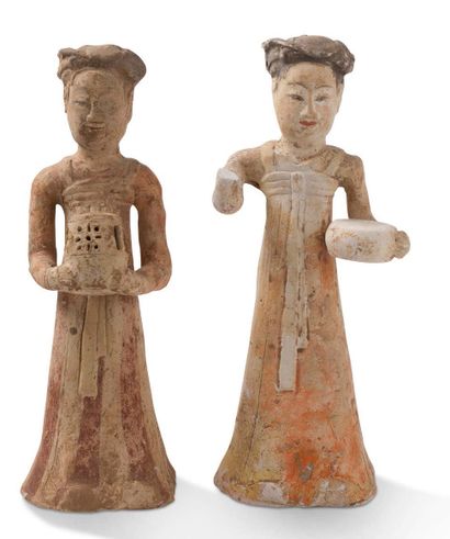 CHINE 
Two Mingqi statuettes in fine clay, white and ochre polychrome, moulded, with...