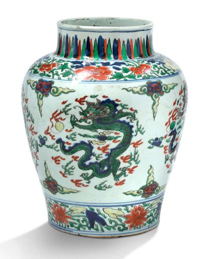 CHINE 
A Wucai porcelain and enamel baluster jar decorated with four dragons coiled...