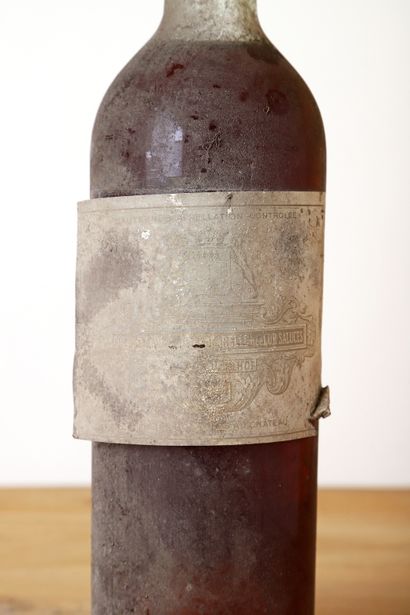 null 1 B CHÂTEAU FILHOT (H.E.+-; e.t.h. à e.a; c.s. bombée; bouchon et capsule estampés)...