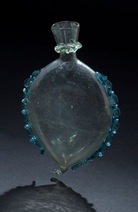 null Small heart-shaped flask of transparent colourless glass decorated with two...
