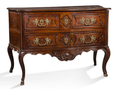 null A PROVENCALE JUGGING COMMODE made of natural wood, molded and richly carved,...
