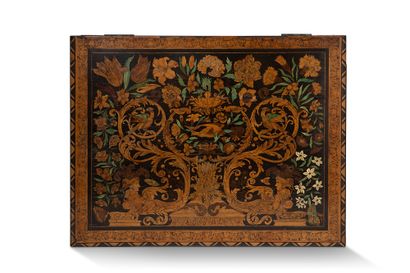 null Rectangular box with rich inlaid decoration of various woods, bone and green...