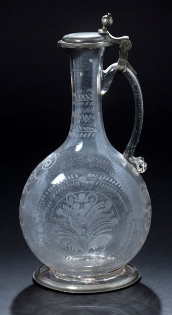 Blown glass decanter with wheel-engraved...
