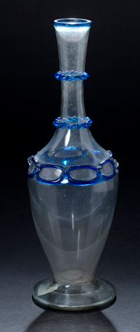 Glass bottle of baluster form with blue net...