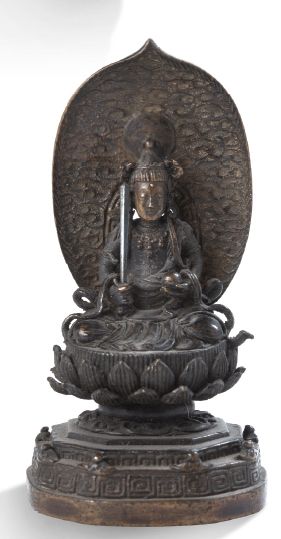 JAPON PÉRIODE ÉDO, XVIIE - XVIIIE SIÈCLE Statuette en bronze de patine brune, représentant...