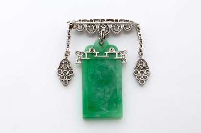 CARTIER 
PAGODE" diamond and jadeite brooch engraved with two scenes of a bird perched...