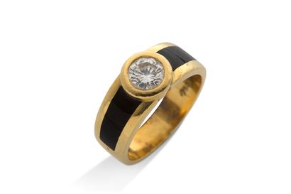 Bague diamant Bague diamant 
Email noir, or jaune 18K (750) 
Diamant : 0.63 carat...