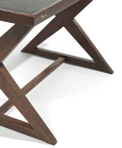 Pierre Jeanneret (1896-1967) 
A teak desk or table with X-shaped legs In teak; rectangular...