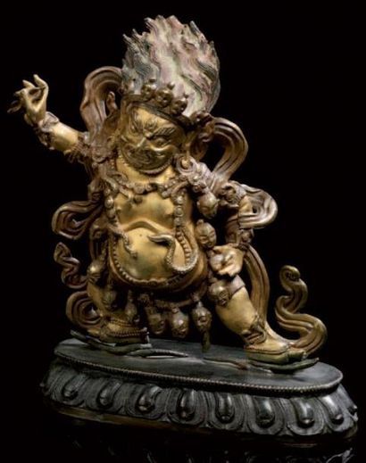 null ART SINO-TIBETAIN Figurine en bronze doré représentant Vajrapani debout sur...