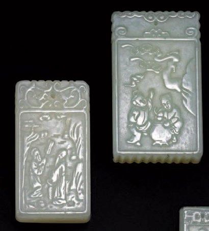 CHINE Deux plaquettes en jade à décor sculpté en léger relief XXème siècle. H 6.5...