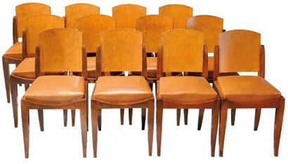 FRANCISQUE CHALEYSSIN (1872-1951) Suite de douze chaises en placage de loupe d'amboine...