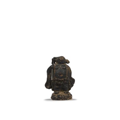null China, circa 1880

Antique lacquered bronze statuette, representing one of the...