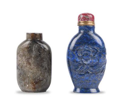 CHINE FIN XIXE SIÈCLE 
Two baluster flasks, one in beige soapstone decorated with...