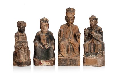 null China, 20th century

Six carved wooden Buddhist deities seated in majesty on...