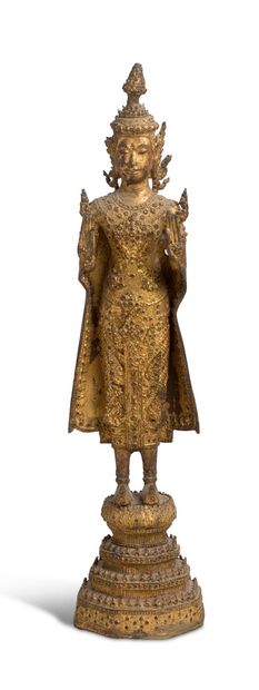 SIAM, RATHANAKOSIN XIXE SIÈCLE 


Statuette en bronze laqué et doré, représentant...