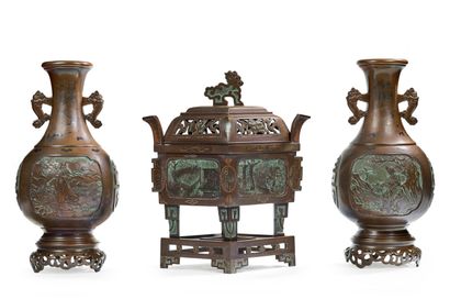 INDOCHINE VERS 1900 
A pair of vases and a covered four-legged incense burner in...