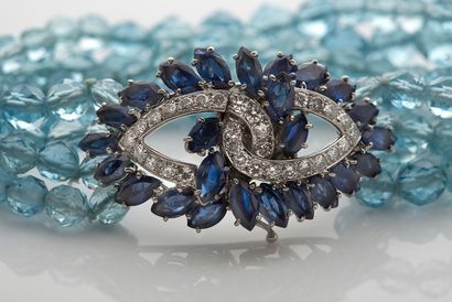 CARTIER BRACELET «TORSADE»
De perles d'aigue-marine facettées
Saphirs navettes, diamants,...