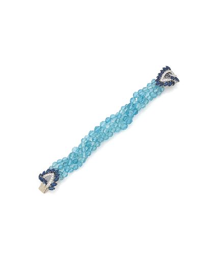 CARTIER BRACELET «TORSADE»
De perles d'aigue-marine facettées
Saphirs navettes, diamants,...